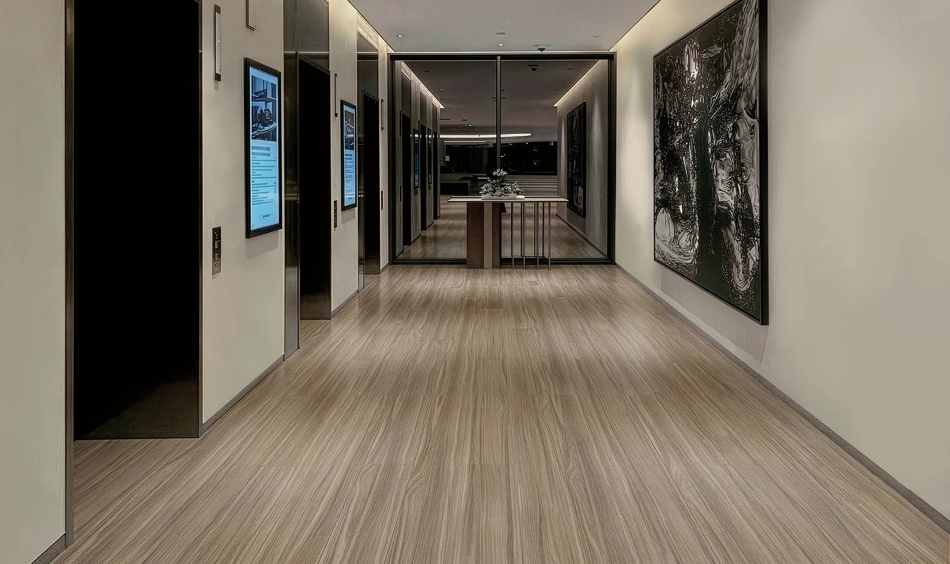 A hallway in a building with a long, narrow design. AI generated content